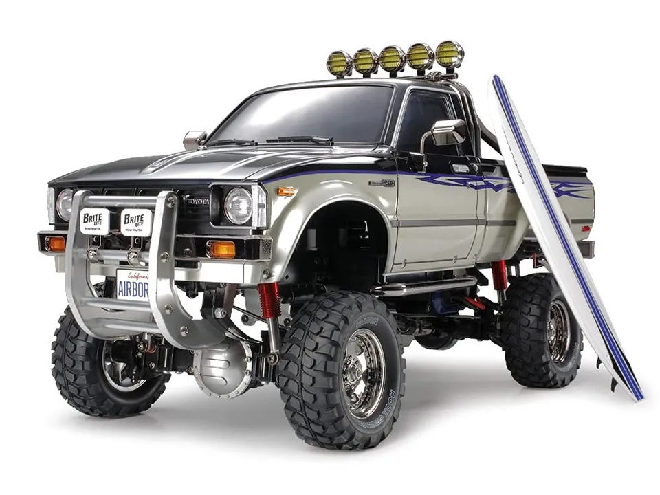 tamiya-toyota-hilux-highlift-rc-bausatz-4x4-1-10-58397-3-gang image 1